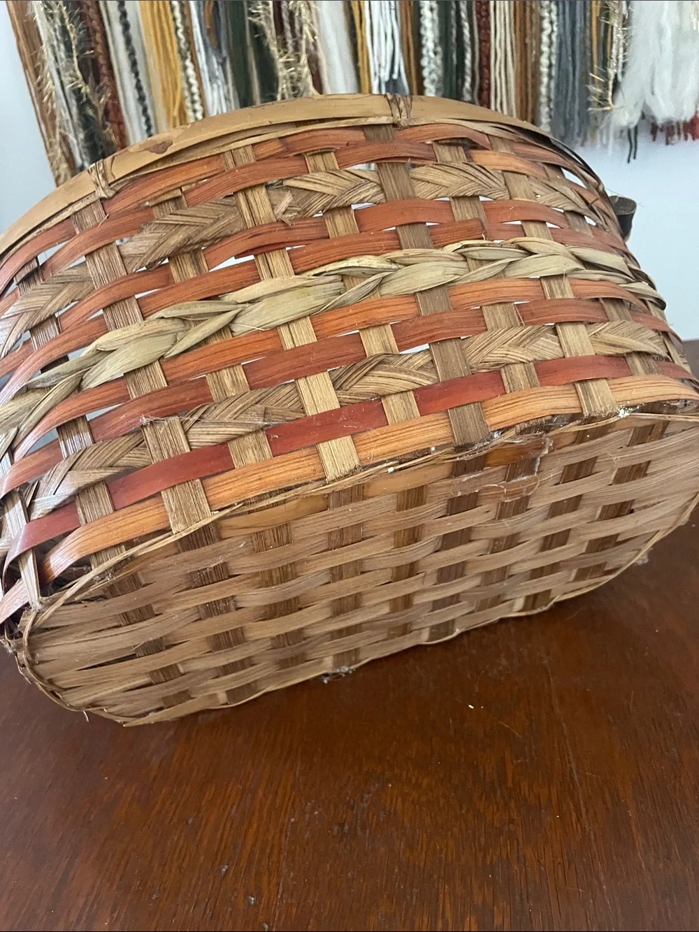 Brown and tan basket with handles